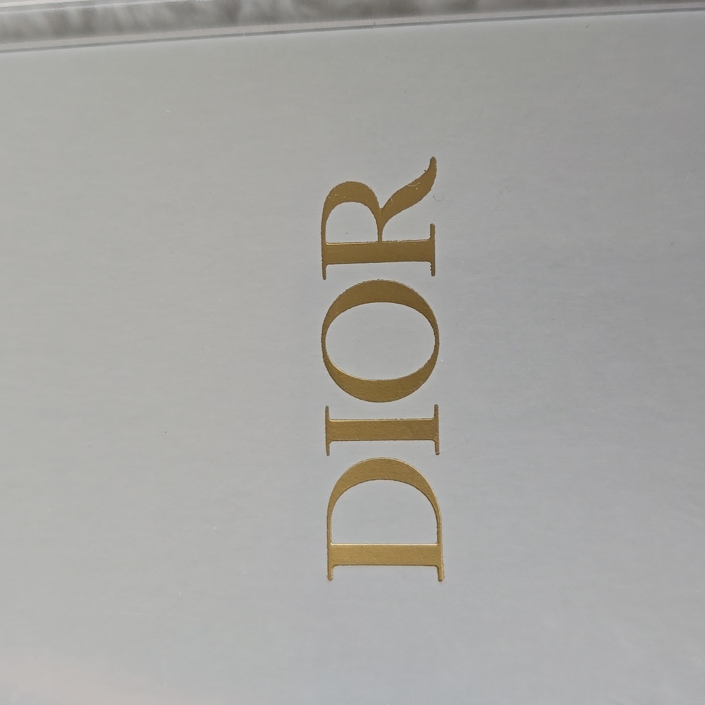 Dior White Card with Gold Logo in Clear Holder